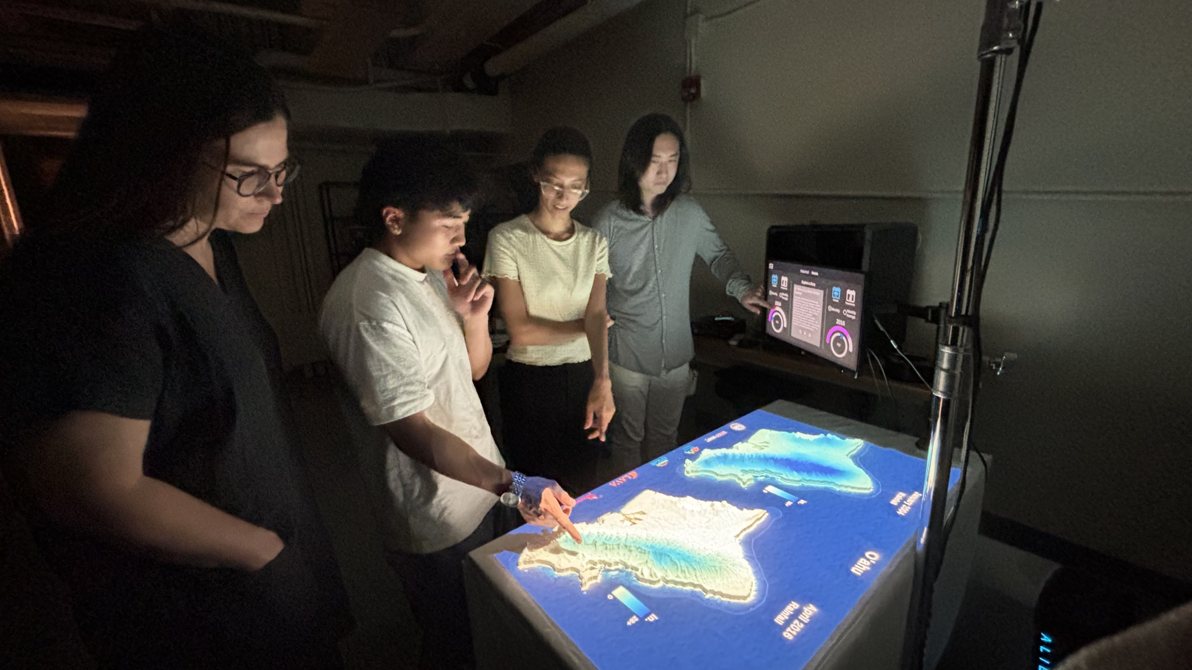 People interacting with tool